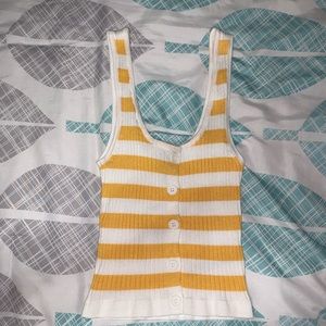 Yellow and white stripped tank